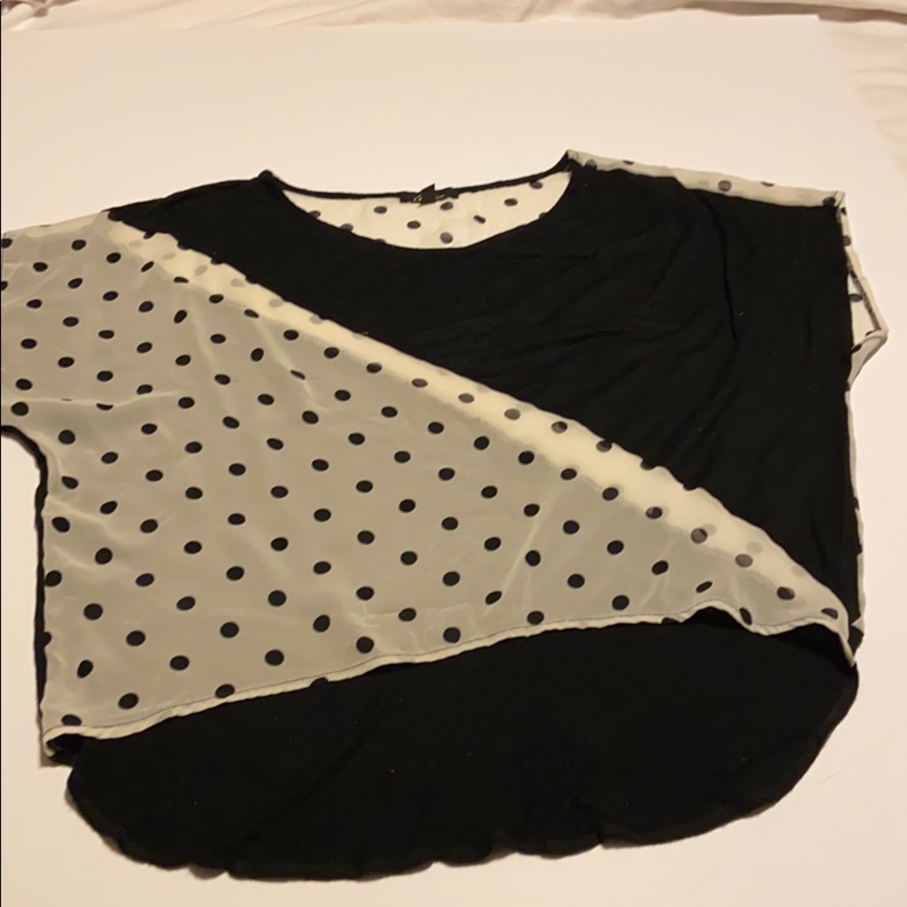 Black and cream half and half Polk dots top